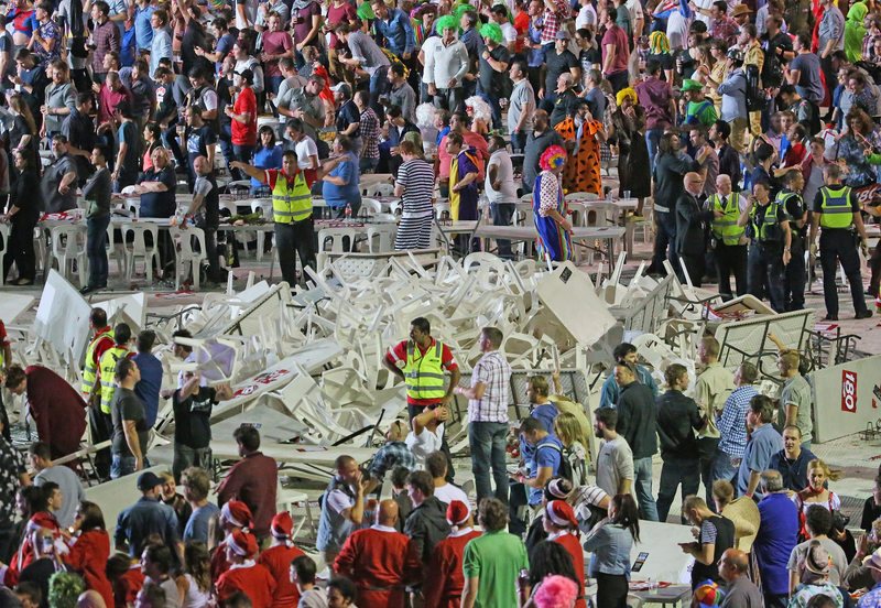 Illustration for article titled Rioting Costumed Fans Halt Australian Darts Competition